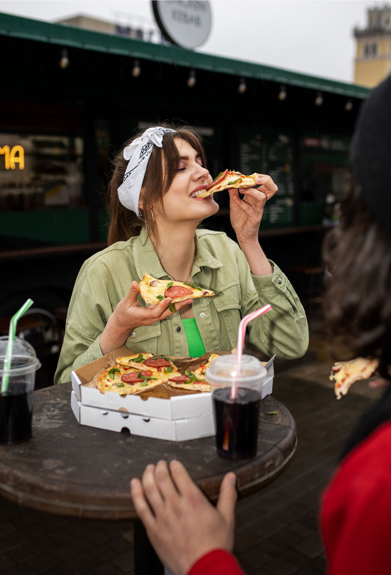 Front view woman with delicious pizza
